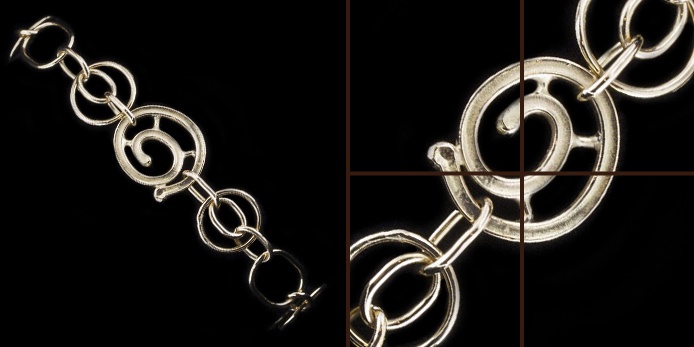 Bracciale a maglie con al centro un elemento a spirale